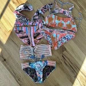 Lots of THREE Maaji swim.. all size Medium and excellent condition.